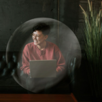 woman wfh on laptop in bubble